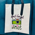 Hand-Painted Cotton Tote Bag with Inside Pocket – “Don’t Forget to Smile” Quote Art Design